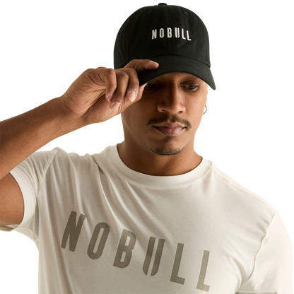 Man wearing black NOBULL hat - front facing
