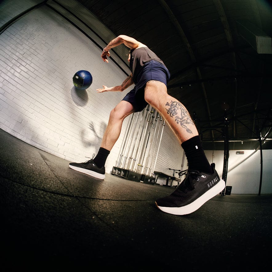 Man wearing the jet black classic white Drive 2