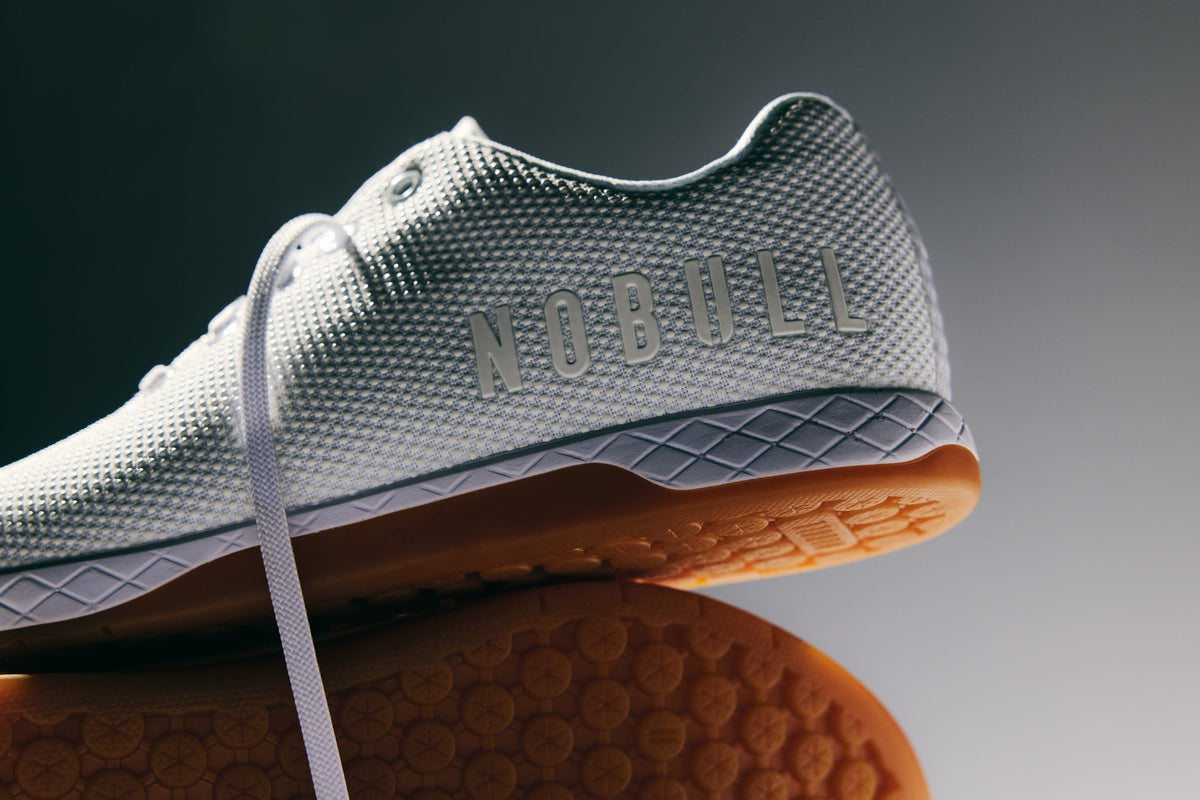 white gum outwork shoes stacked on top of eachother