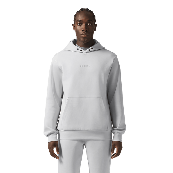 Men's Light Grey NOBULL Elements Hoodie Front Waist Up Angle.