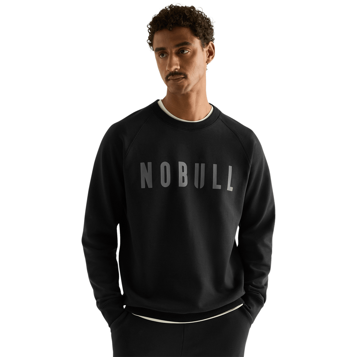 Men's Black NOBULL Layers Crew Sweatshirt front on body angle.