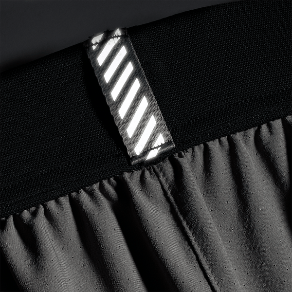 Men's Gargoyle Drive Short 6" (Unlined) Reflective Tab Detail Angle.