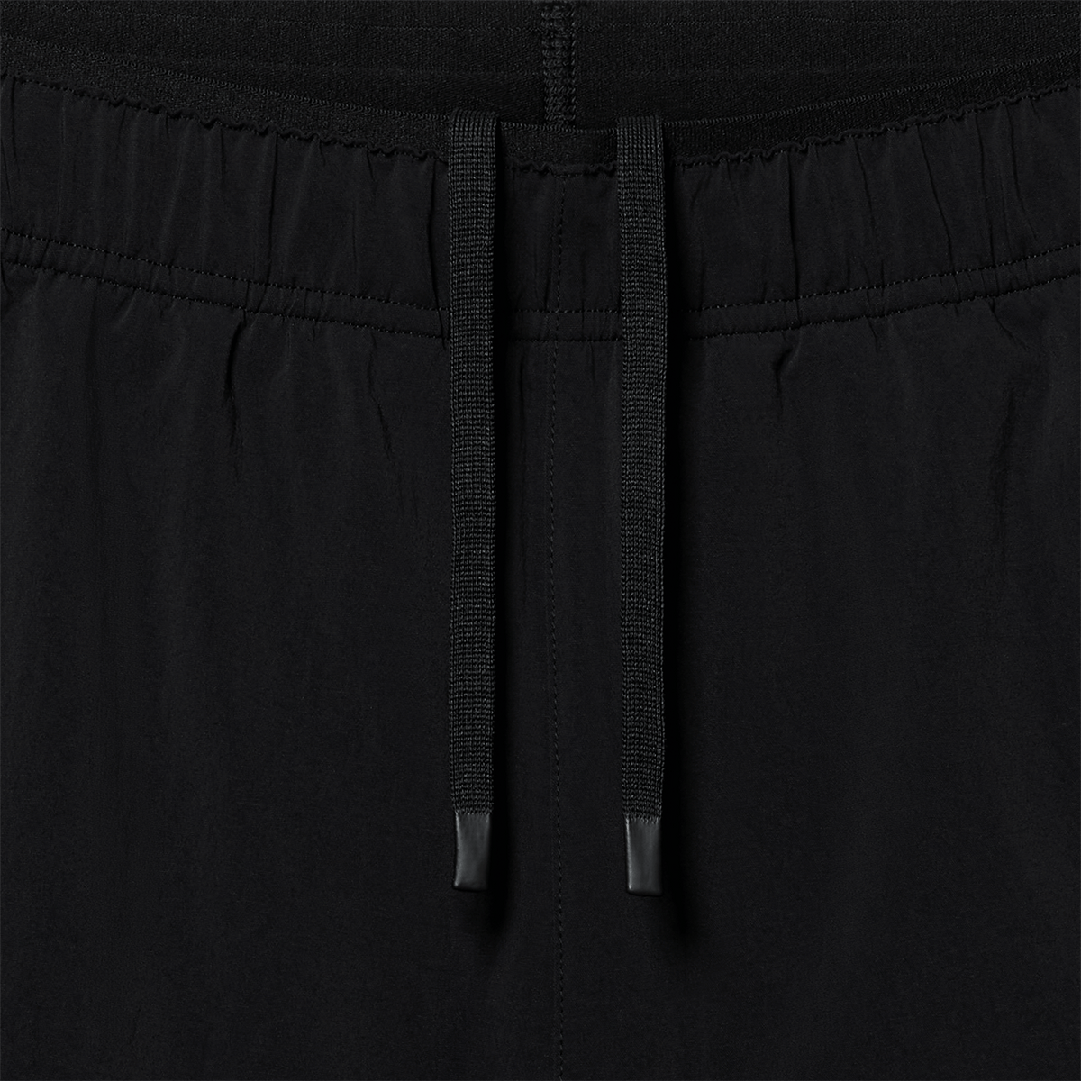 Men's Black NOBULL Training Short 8" (Unlined) Drawstring Macro Fabric Detail Angle.