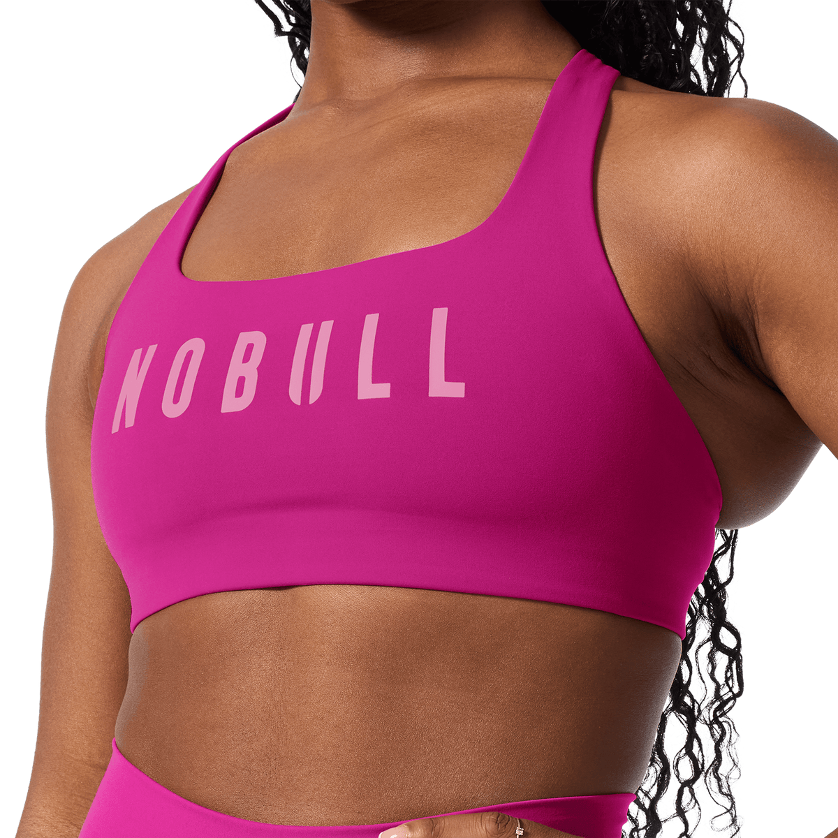 NOBULL Vivid Fuchsia Drive Racerback Bra Front Detail Angle.