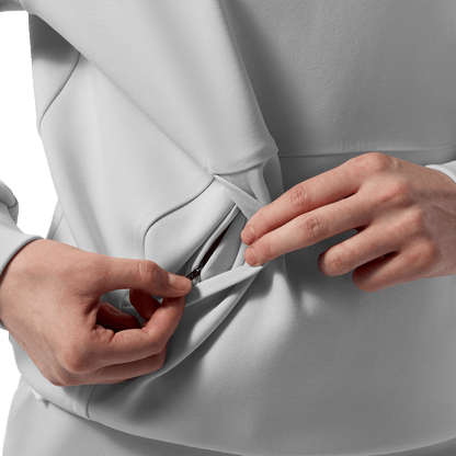 Women's Light Grey NOBULL Elements Hoodie Pocket Detail Angle.
