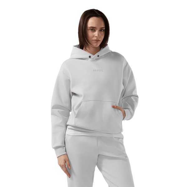 Women's Light Grey NOBULL Elements Hoodie Front On Body Angle.