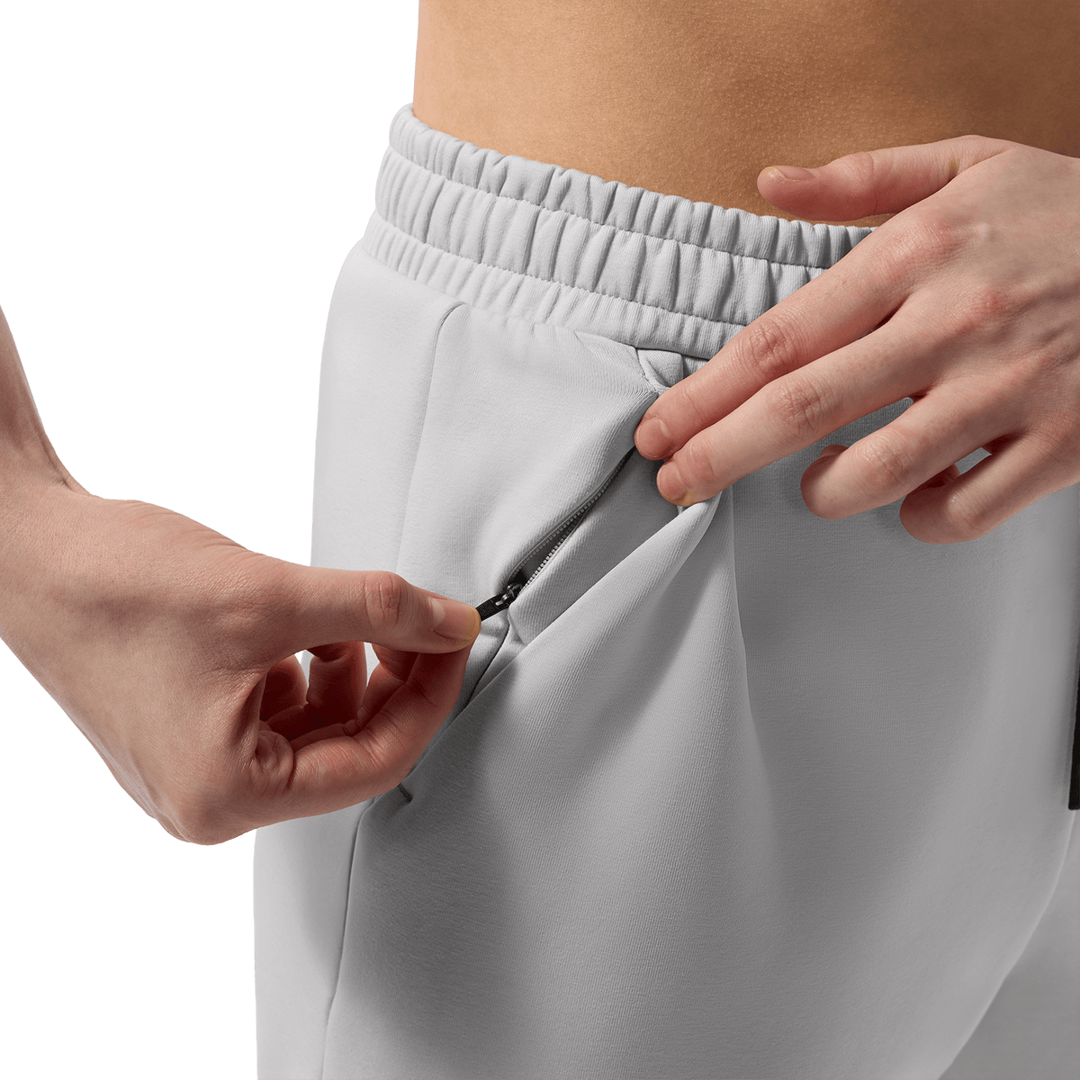 Women's Light Grey NOBULL Element Sweatpants Zipper Pocket Detail Angle.