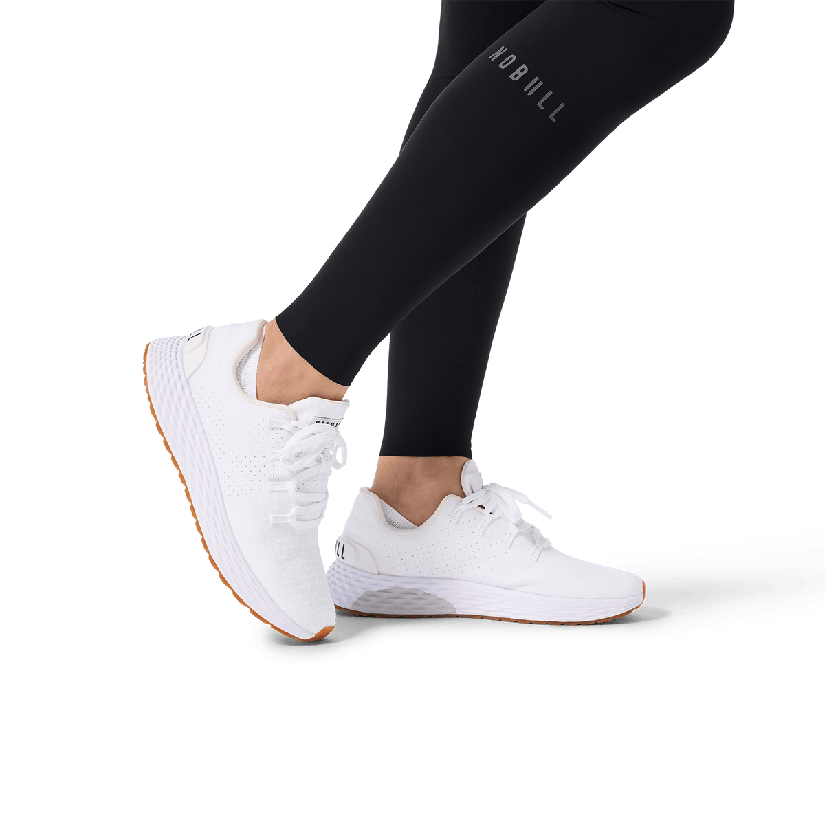 Women's Black High-Rise Drive Pocket Tight 28" Ankle Detail Angle.