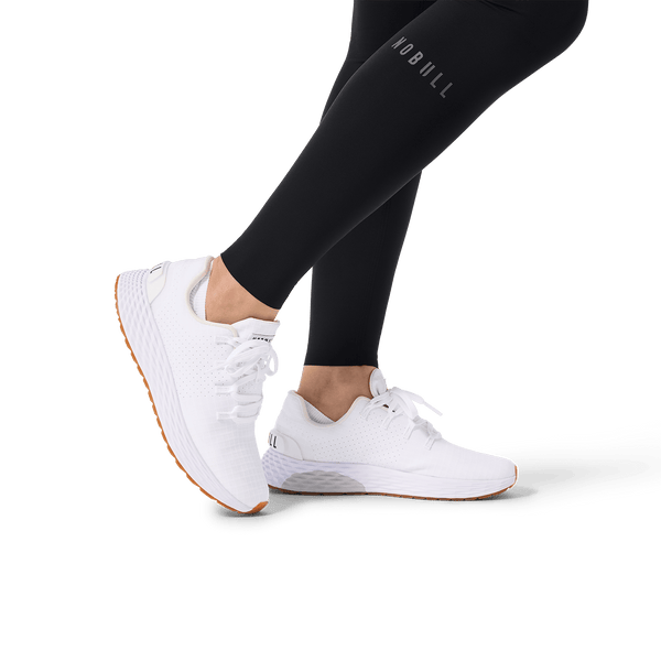 Women's Black High-Rise Drive Pocket Tight 28" Ankle Detail Angle.