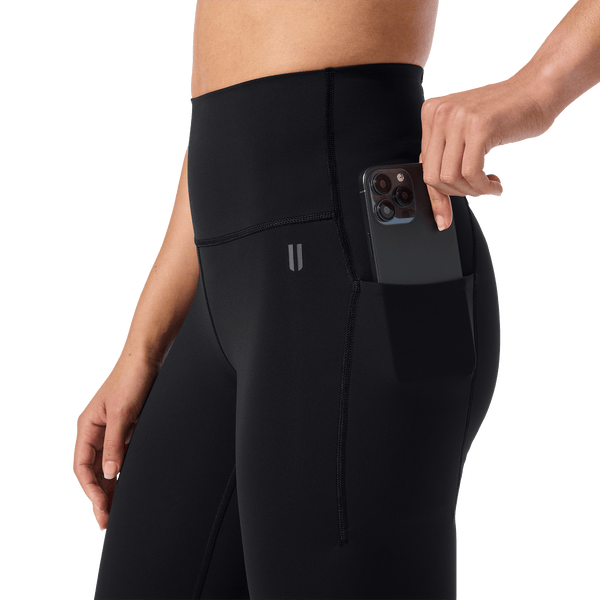 Women's Black High-Rise Drive Pocket Tight 28" Side Pocket Detail Angle.