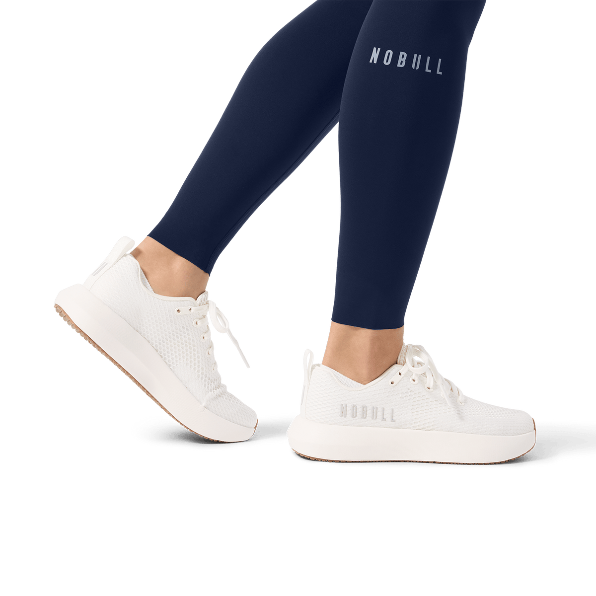 Women's Night Navy High-Rise Drive Pocket Tight 28" Ankle Detail Angle.