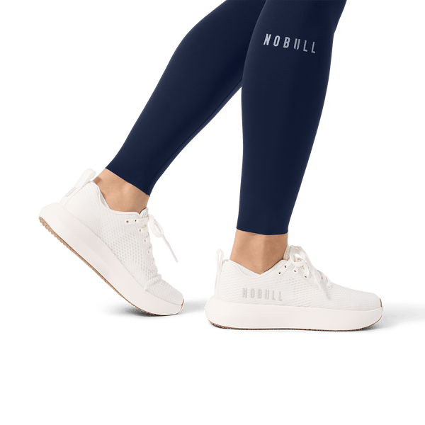 Women's Night Navy High-Rise Drive Pocket Tight 28" Ankle Detail Angle.