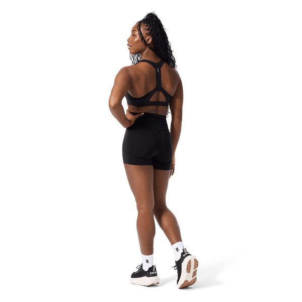 Women's Black High-Rise Drive Short 4" Back Full Body Angle.