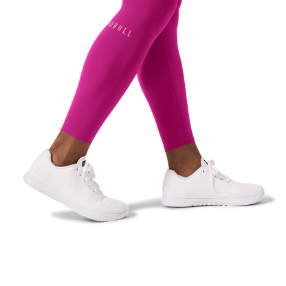 Women's Vivid Fuchsia High-Rise Drive Tight 25" Ankle Detail Angle.