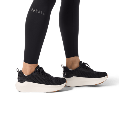 Women's Black High-Rise Drive Tight 25" Lower Body Ankle Angle.