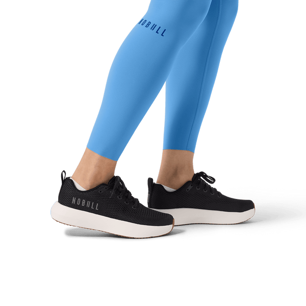 Women's Light Blue High-Rise Drive Tight 25" Lower Body Detail Angle.