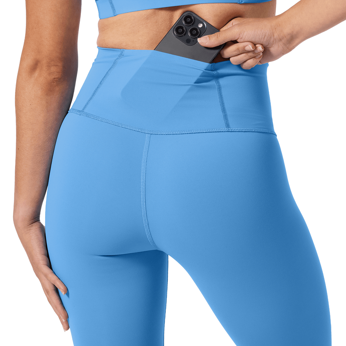 Women's Light Blue High-Rise Drive Tight 25" Back Pocket Detail Angle.