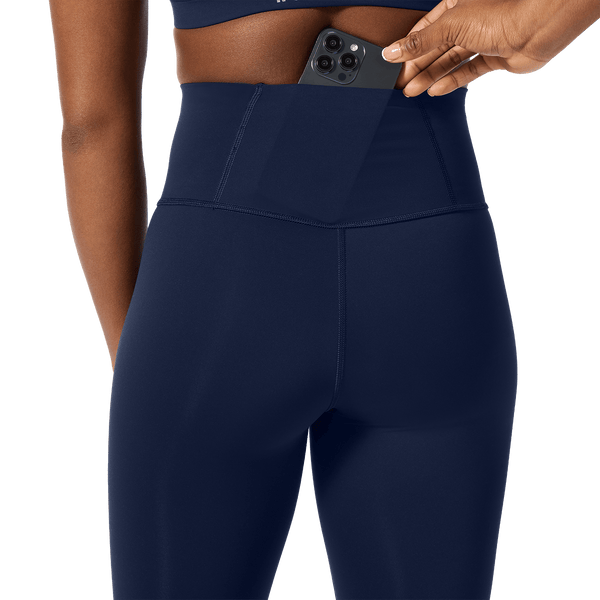 Women's Night Navy High-Rise Drive Tight 28" Back Pocket Detail Angle.
