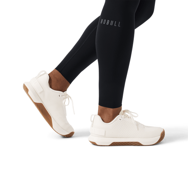 Women's Black High-Rise Drive Tight 28" Ankle Detail Angle.