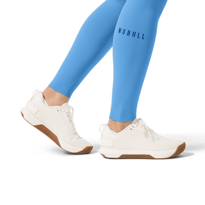 Women's Light Blue High-Rise Drive Tight 28" Ankle Detail Angle.