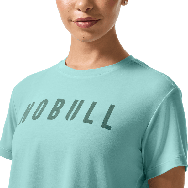 Women's Blue Haze NOBULL Boxy Tee Front Detail On Body Angle.