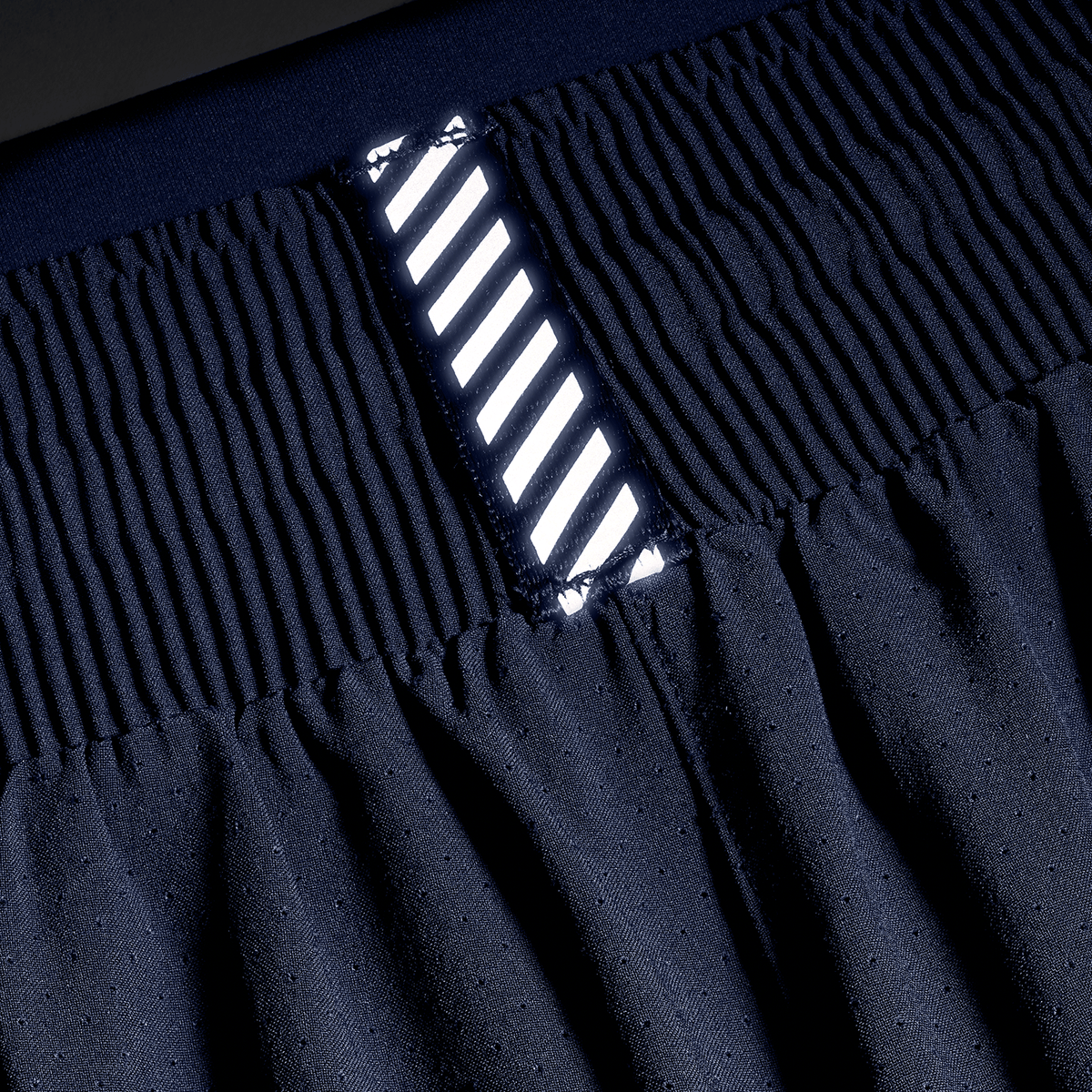 Women's Night Navy Drive 2-in-1 Short 3" Reflective Tab Detail Angle.