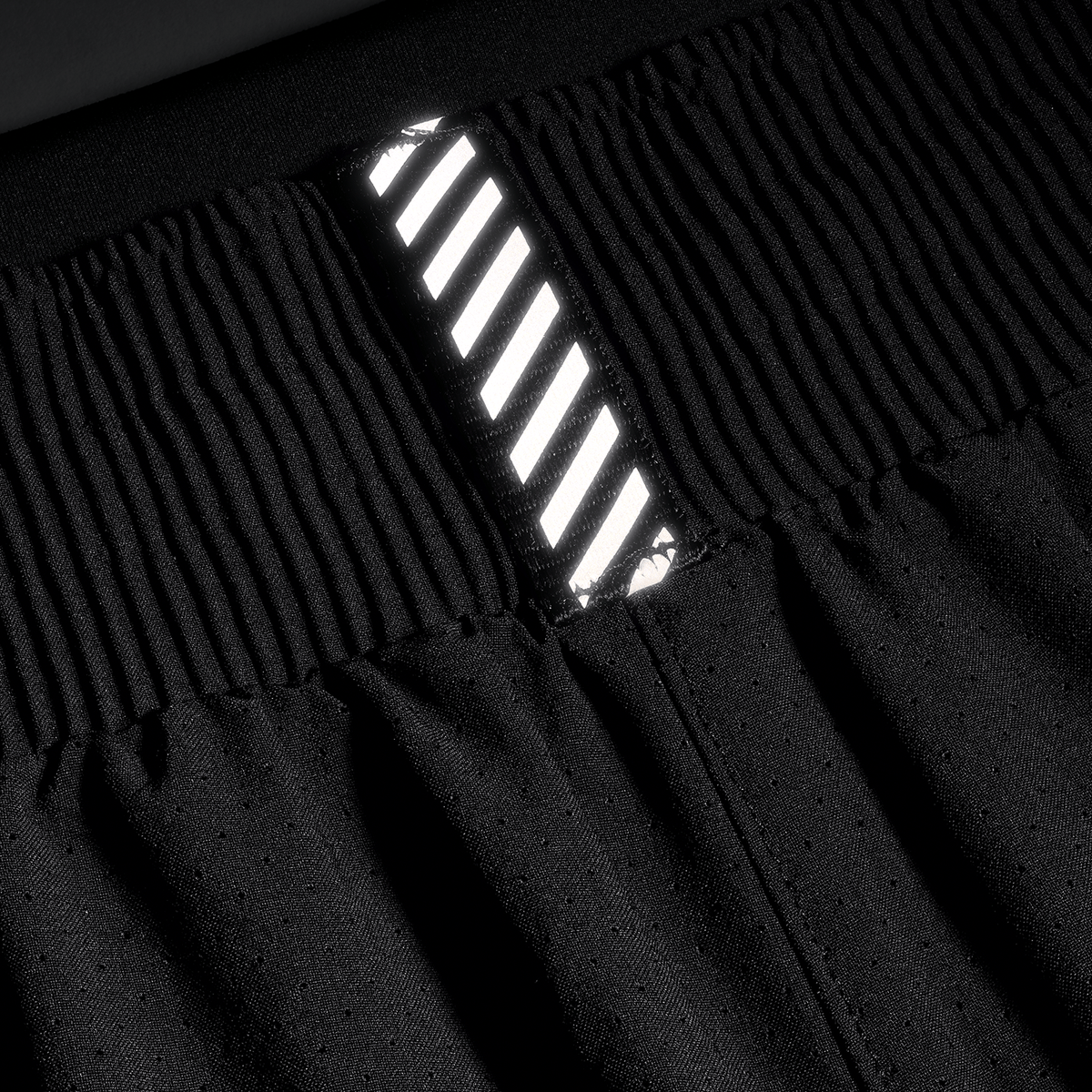Women's Black Drive 2-in-1 Short 3" Reflective Tab Detail Angle.