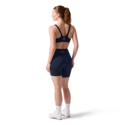 Women's Night Navy U High-Rise Matte Short 6" Back On Body Angle.
