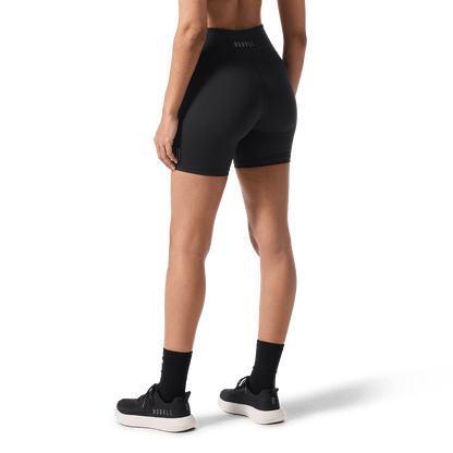 Women's Black U High-Rise Matte Short 6" Back Lower Body Angle.