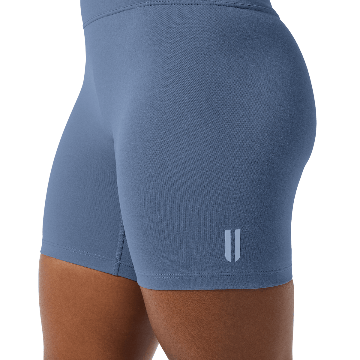 Women's Dusty Blue U High-Rise Matte Short 6" Logo Detail Angle.