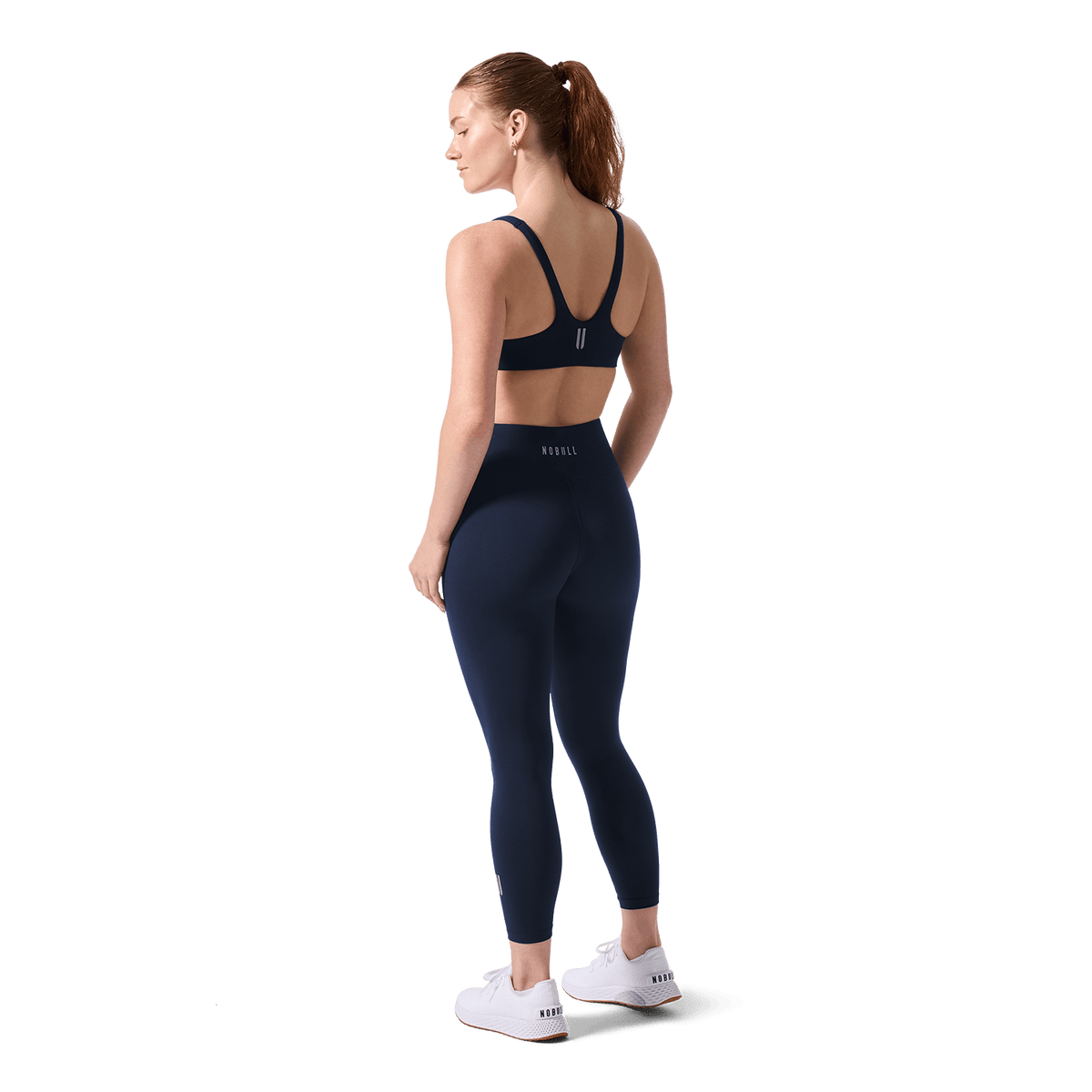 Women's Night Navy U High-Rise Matte Tight 25" Back Full Body Angle.