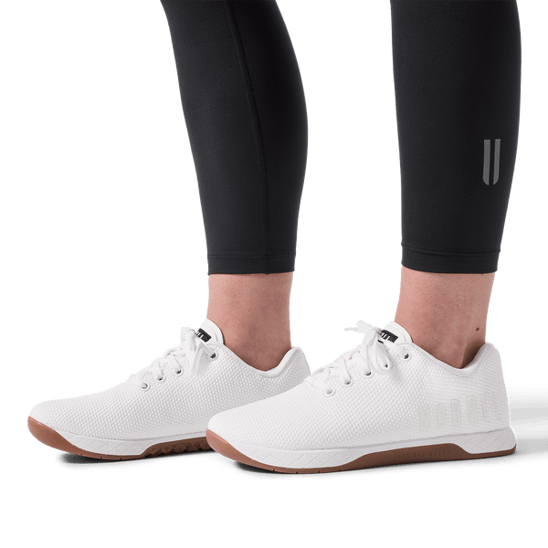 Women's Black U High-Rise Matte Tight 25" Detail Angle.