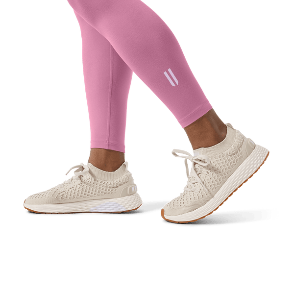 Women's Soft Pink U High-Rise Matte Tight 25" Footwear Detail Angle.