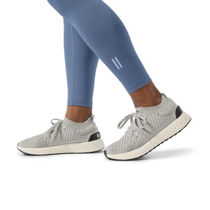 Women's Dusty Blue U High-Rise Matte Tight 25" Footwear Detail Angle.