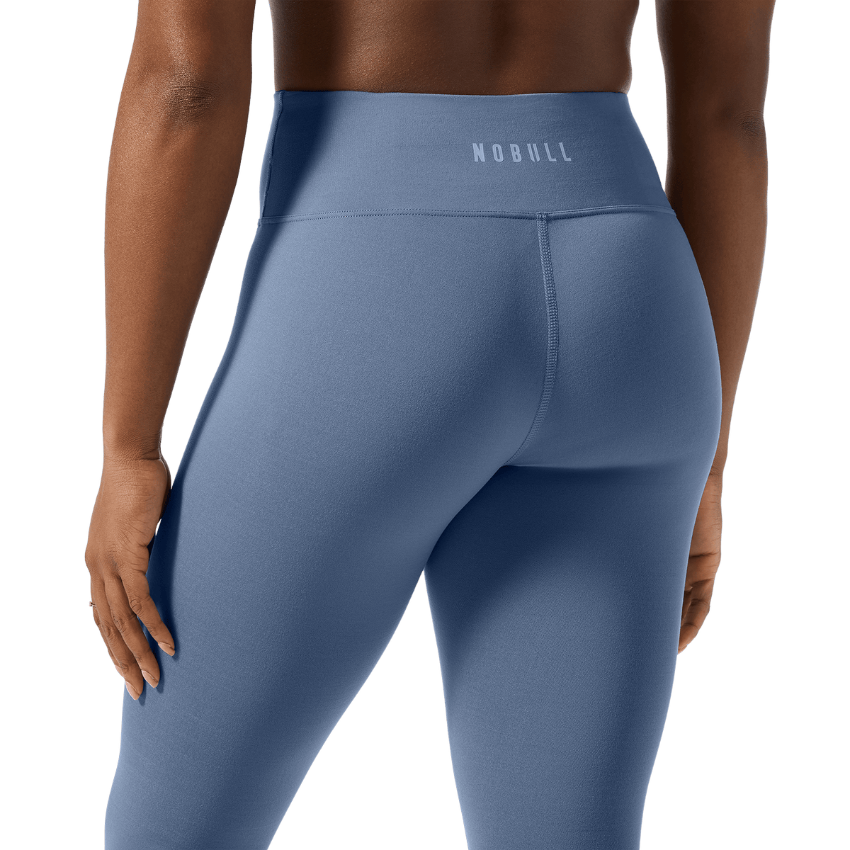 Women's Dusty Blue U High-Rise Matte Tight 25" Back Detail Angle.