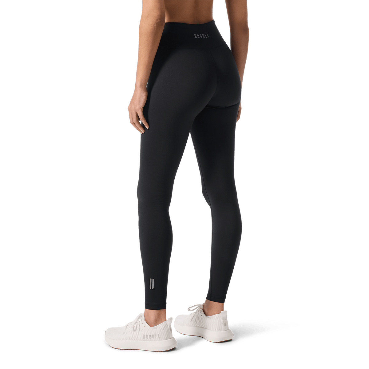 Women's Black U High-Rise Matte Tight 28" Back Lower Body Angle.
