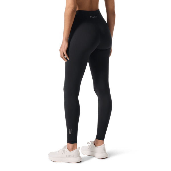 Women's Black U High-Rise Matte Tight 28" Back Lower Body Angle.