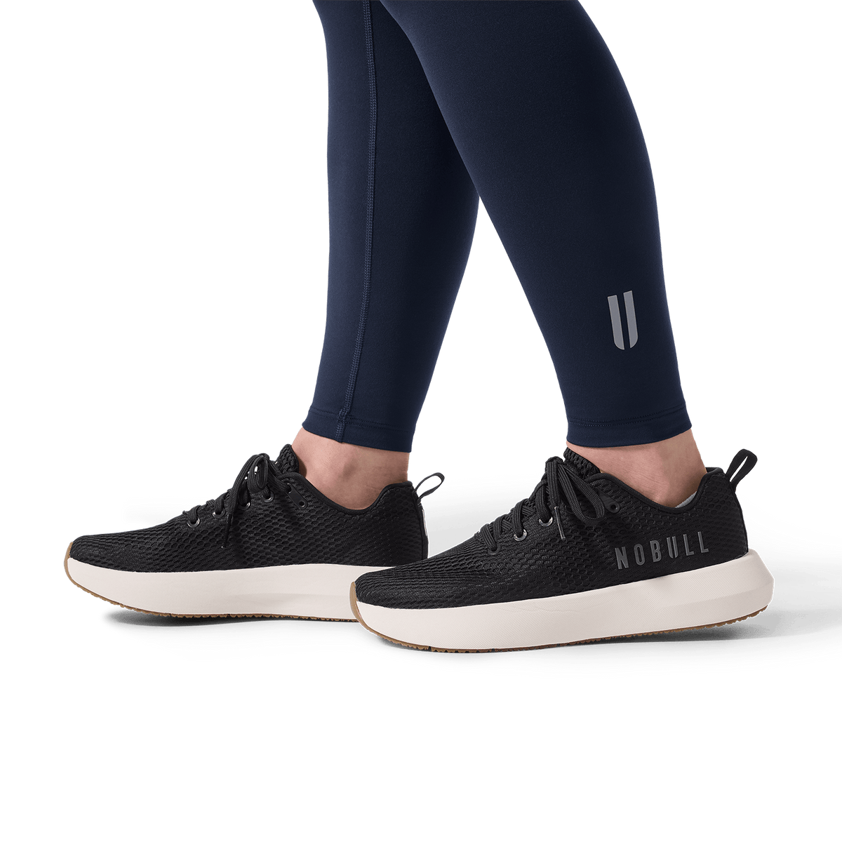 Women's Night Navy U High-Rise Matte Tight 28" Detail Angle.