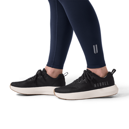 Women's Night Navy U High-Rise Matte Tight 28" Detail Angle.