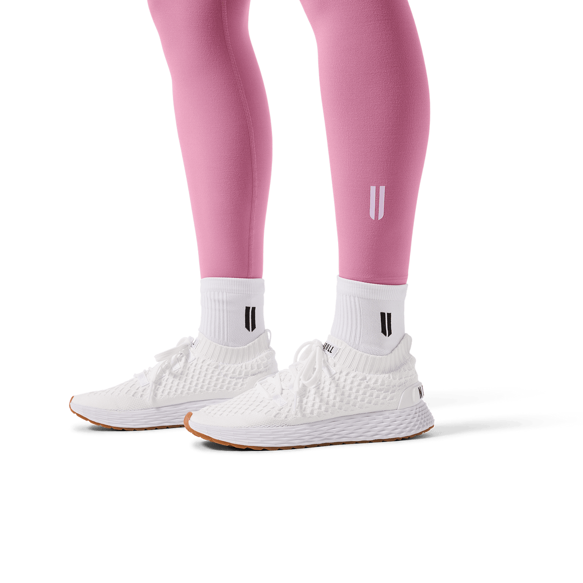 Women's Soft Pink U High-Rise Matte Tight 28" Footwear Detail Angle.