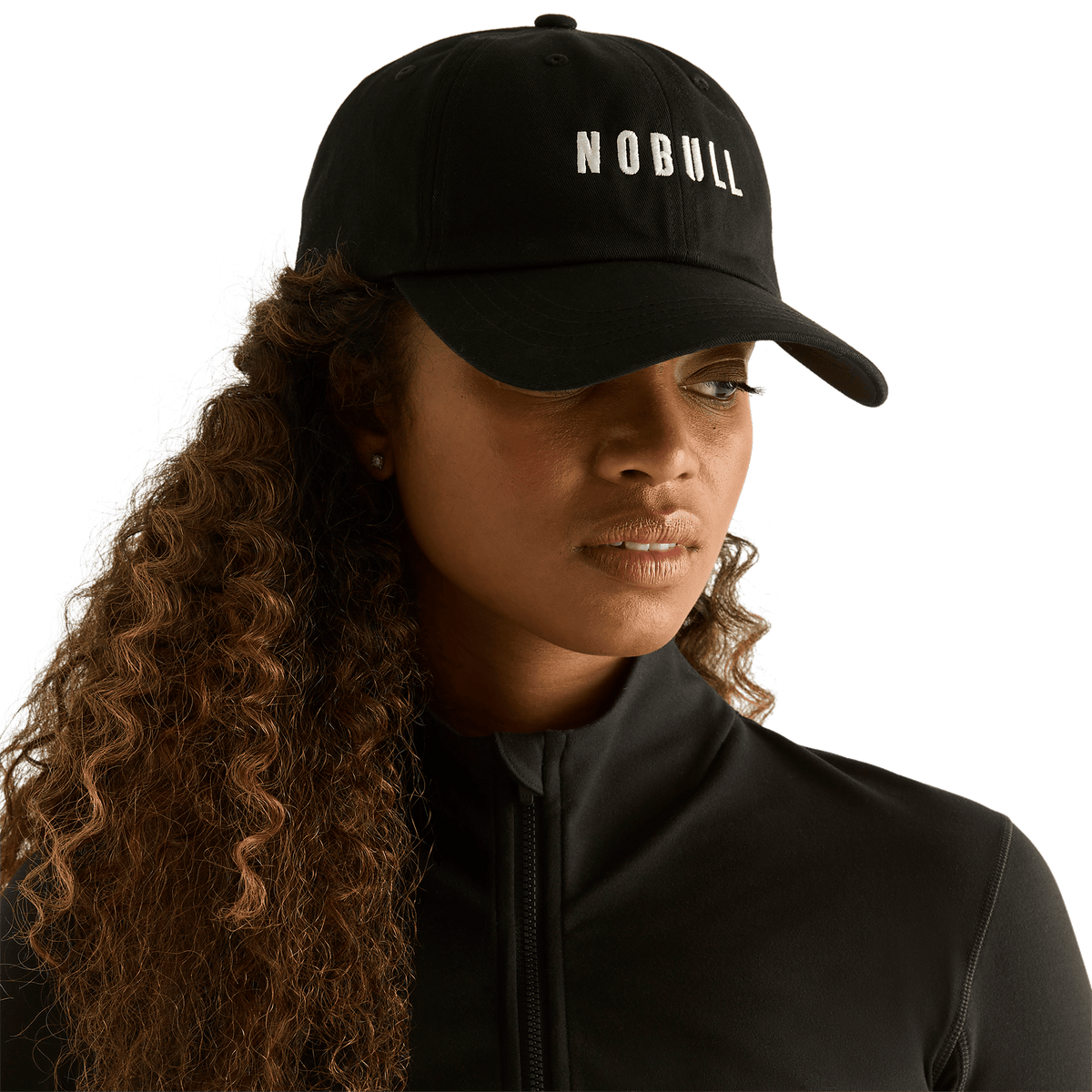 Woman wearing black NOBULL hat - front facing
