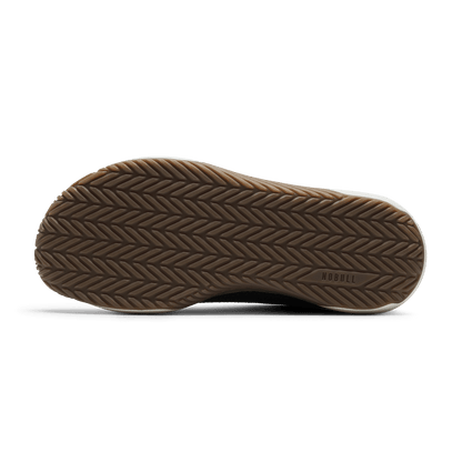 Jet Black Classic White Gum Outwork Flex Shoe Bottom Angle.