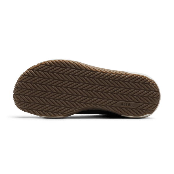 Jet Black Classic White Gum Outwork Flex Shoe Bottom Angle.