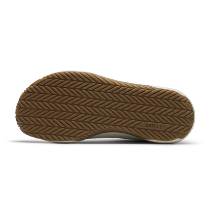 Classic White Gum Outwork Flex Shoe Bottom Side Angle.