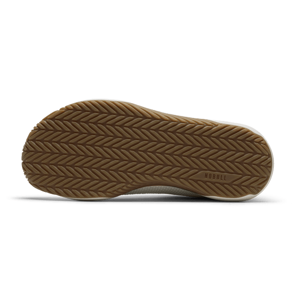 Classic White Gum Outwork Flex Shoe Bottom Side Angle.