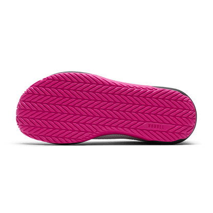 Classic White Pink Glo Outwork Flex Shoe Bottom Angle.